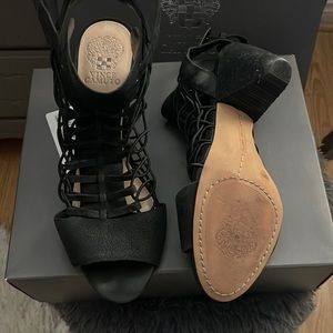 Black pumps, worn once, they were comfortable.